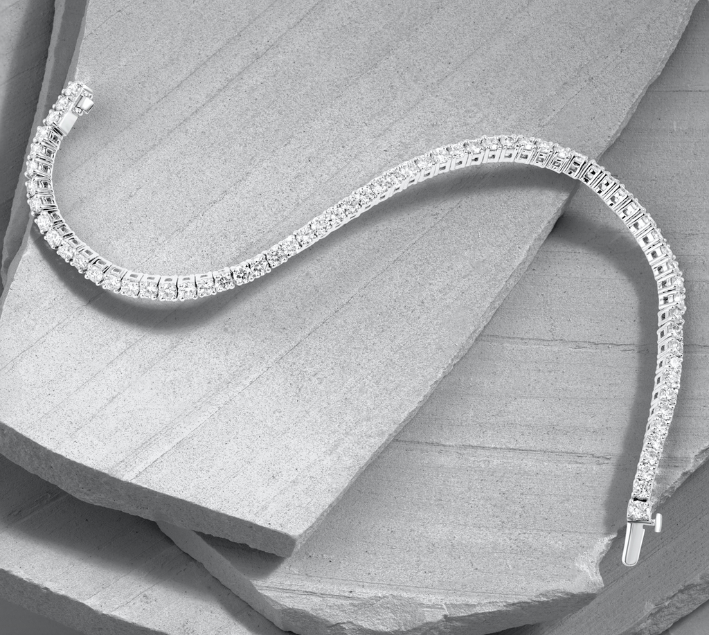 diamond-tennis-bracelet-on-natural-grey-stone