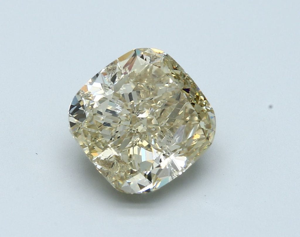 7.02 ct. Fancy Brownish Yellow/I1 Cushion Diamond