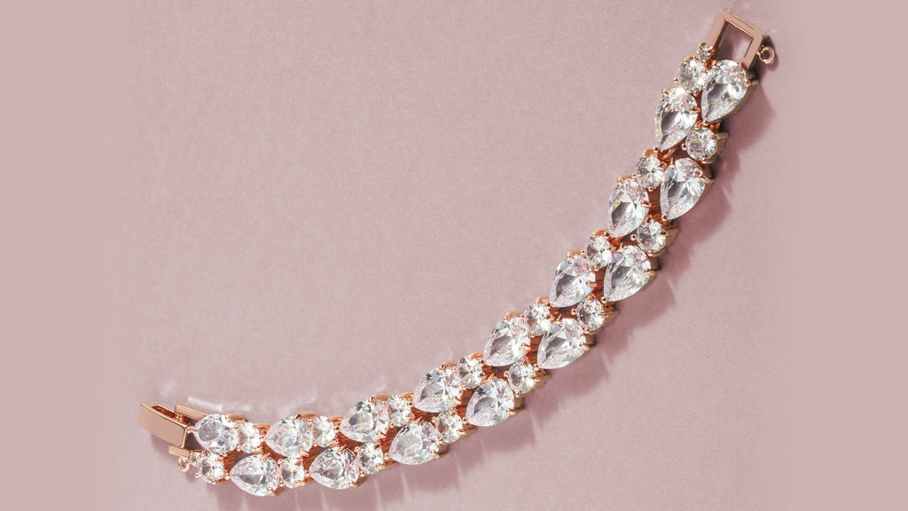 flashy-diamond-bracelet-with-large-gems-on-pink-background