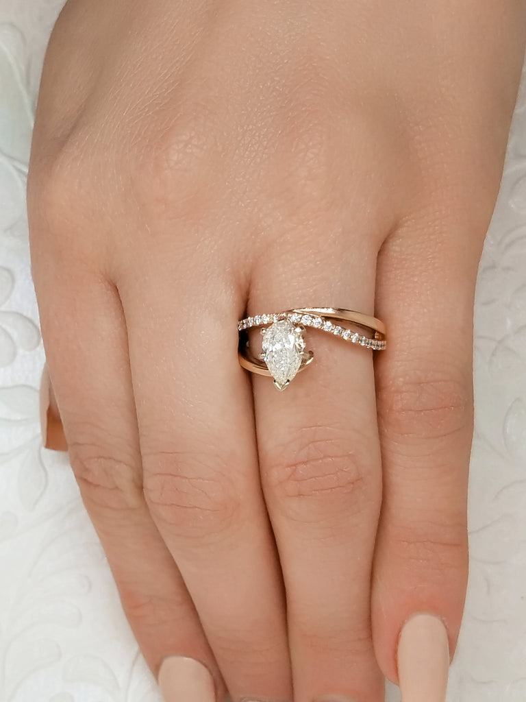 84867 - Rose Gold Pear Diamond Engagement Ring on hand